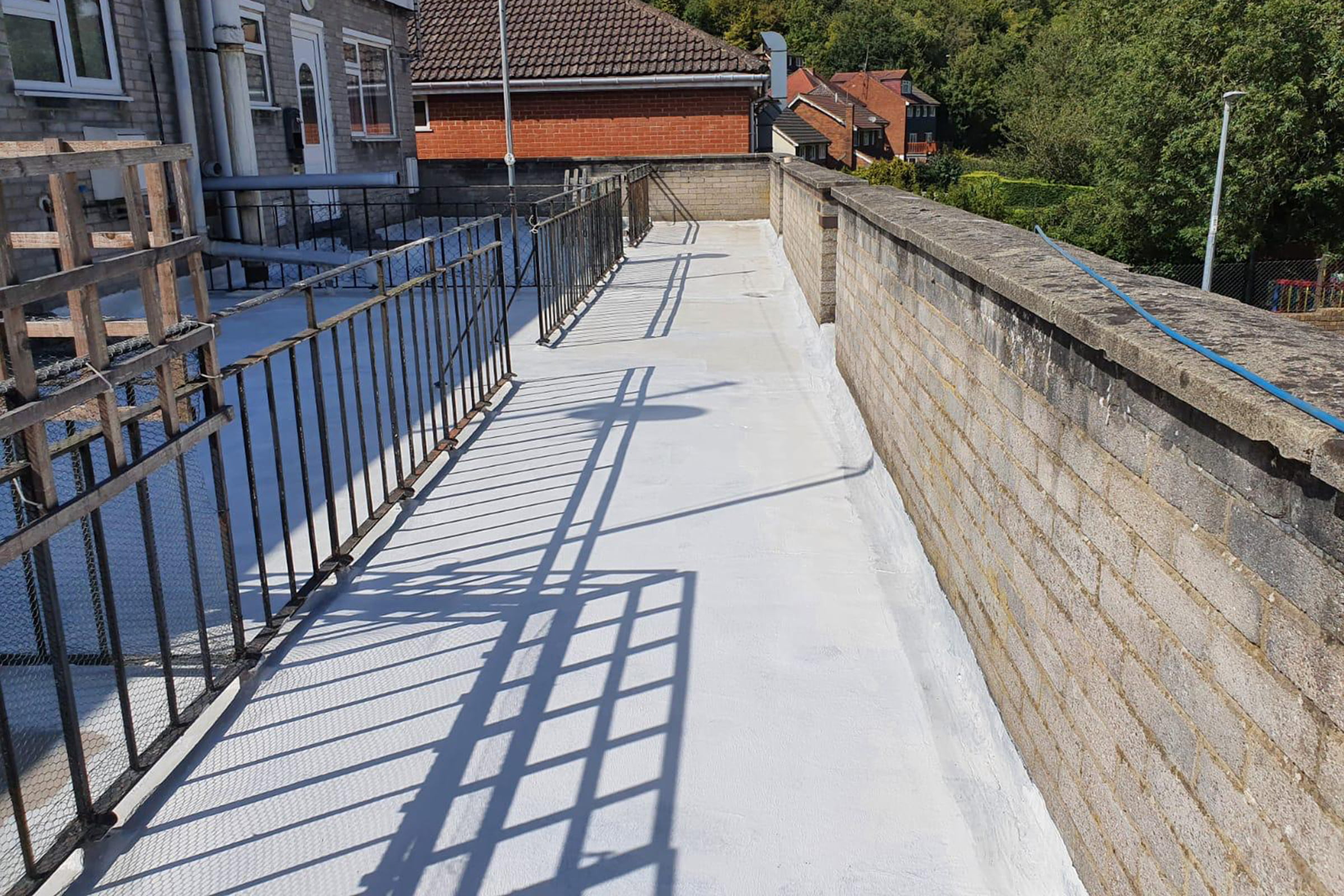 Elastomeric waterproofing, used on a walkway in kent