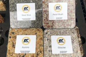 Resin bound expert presentation kit, showing the many colour options and aggregate styles available