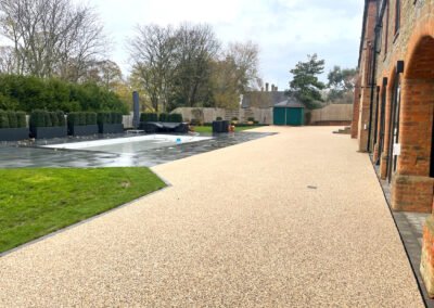 Large resin bound driveway, showing house and swimming pool