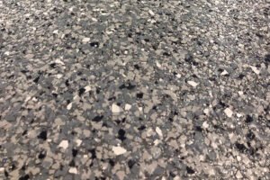 A close up shot of a floor created with an epoxy flake system