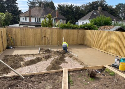 Screed contractor working with traditional screed for a patio / outside bar area in northamptonshire