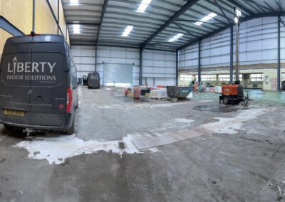 Liberty floor solutions vans and equipment and materials in place prior to the resurfacing beginning