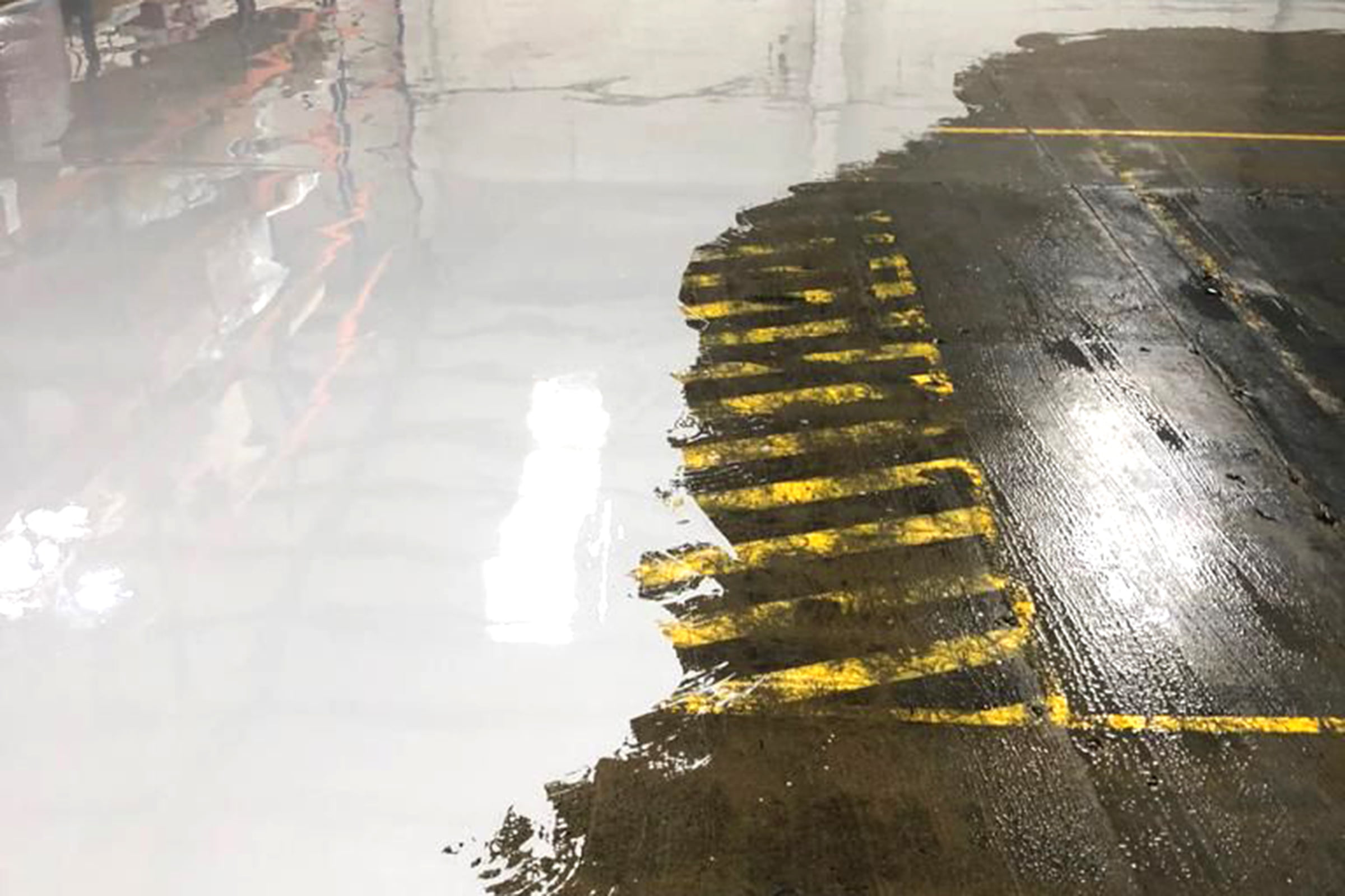 Garage floor, showing the application of our Epoxy self smoothing resin - LFS Epoxy SL