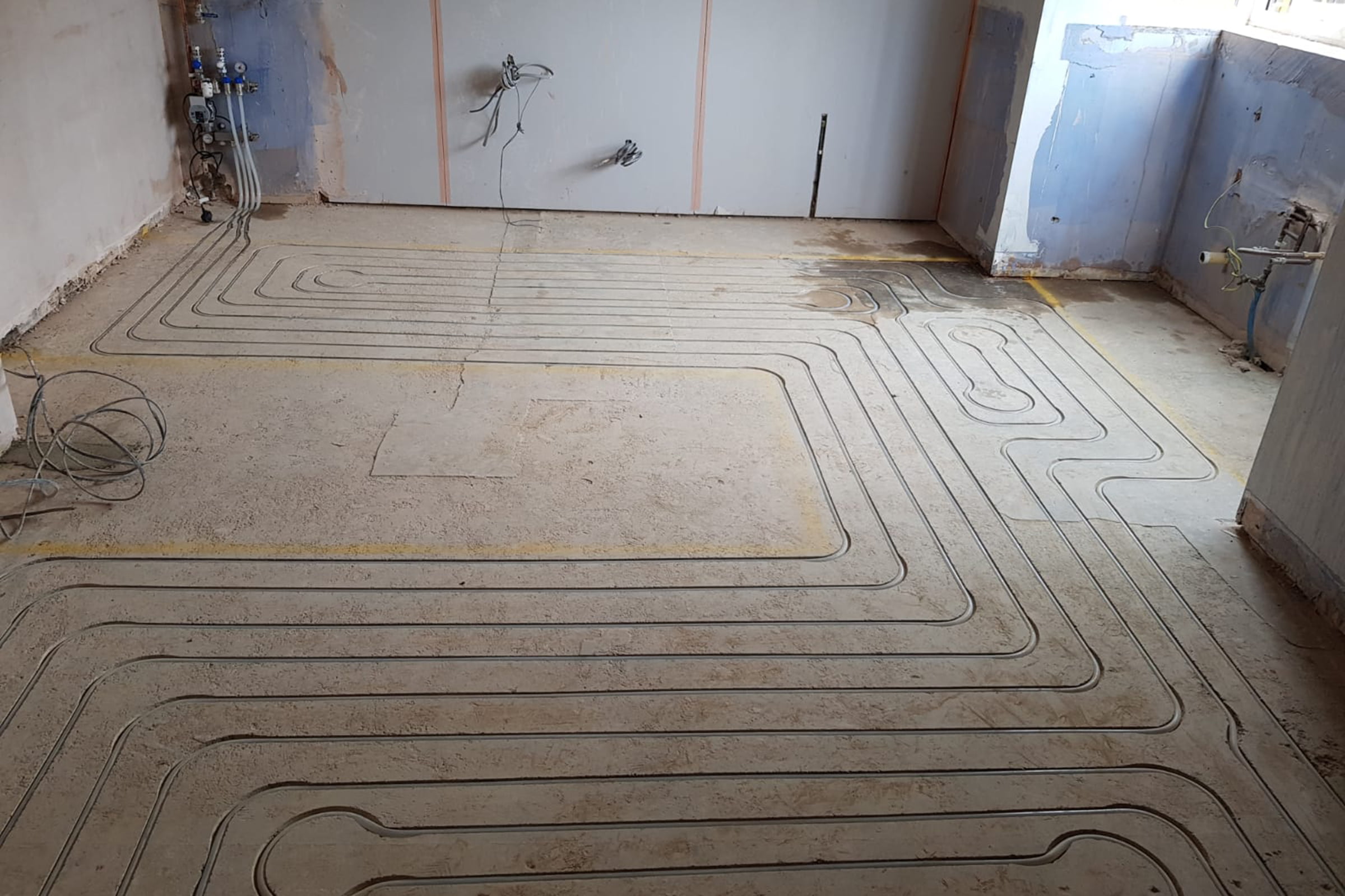 Routed underfloor heating and screed – Bedford