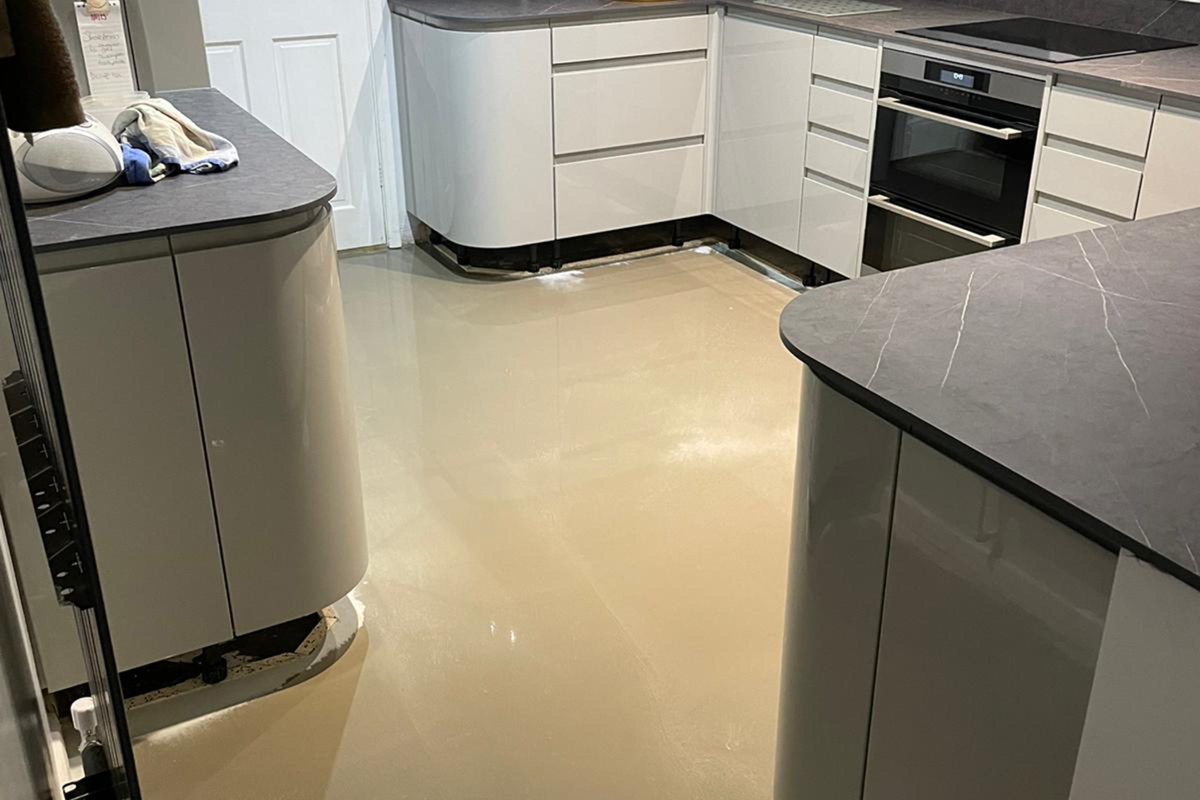 Self levelling screed in a kitchen at a private residence in Peterborough