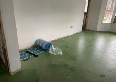 A roll of thermosphere underfloor heating mesh ready to be instaled