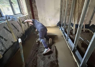 Floor screed contractor using fast drying screed additive at a new build home in brixworth, northampton