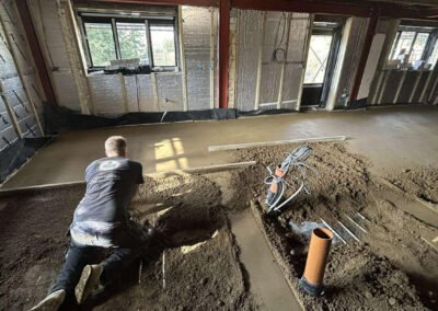 Floor screed contractor using fast drying screed additive at a new build home in brixworth, northampton