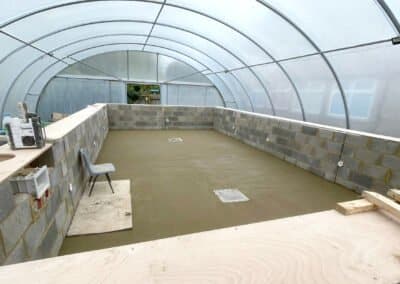 Finished floor screed base in a swimming pool at walgrave school, northants