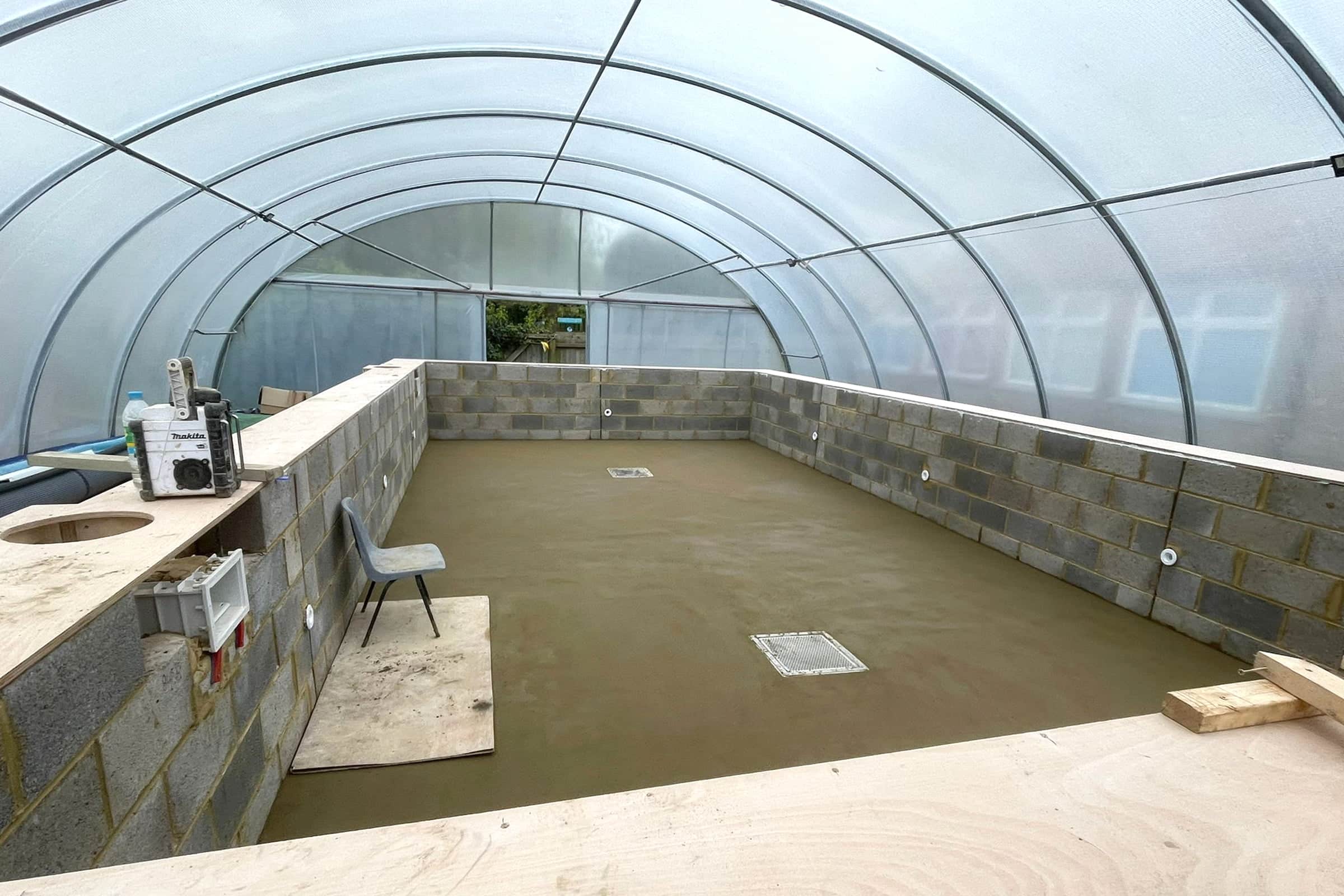 Finished floor screed base in a swimming pool at Walgrave school, Northants