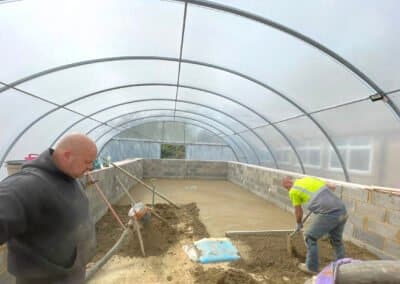 Floor screeding contractors installing screed in a swimming pool