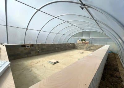 Concrete floor of swimming pool prior to installation of floor screed