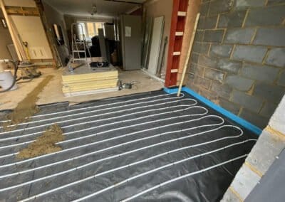 Underfloor heating installation before floor screed is installed