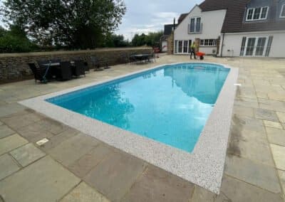 Resin bound surround at an outdoor swimming pool in northants