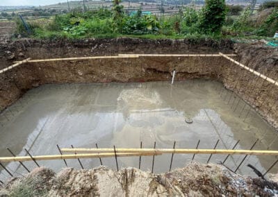 Wet concrete in finished swimming pool base in leicestershire
