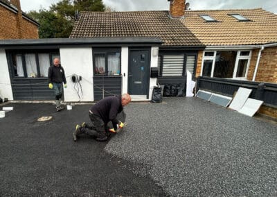 Contractors installing a resin bound driveway in bicester