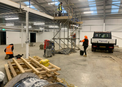 Flooring contractors in a warehouse