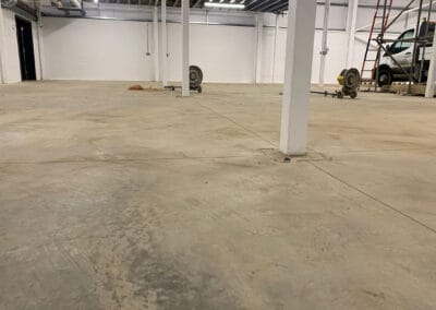 Concrete warehouse floor prior to grinding