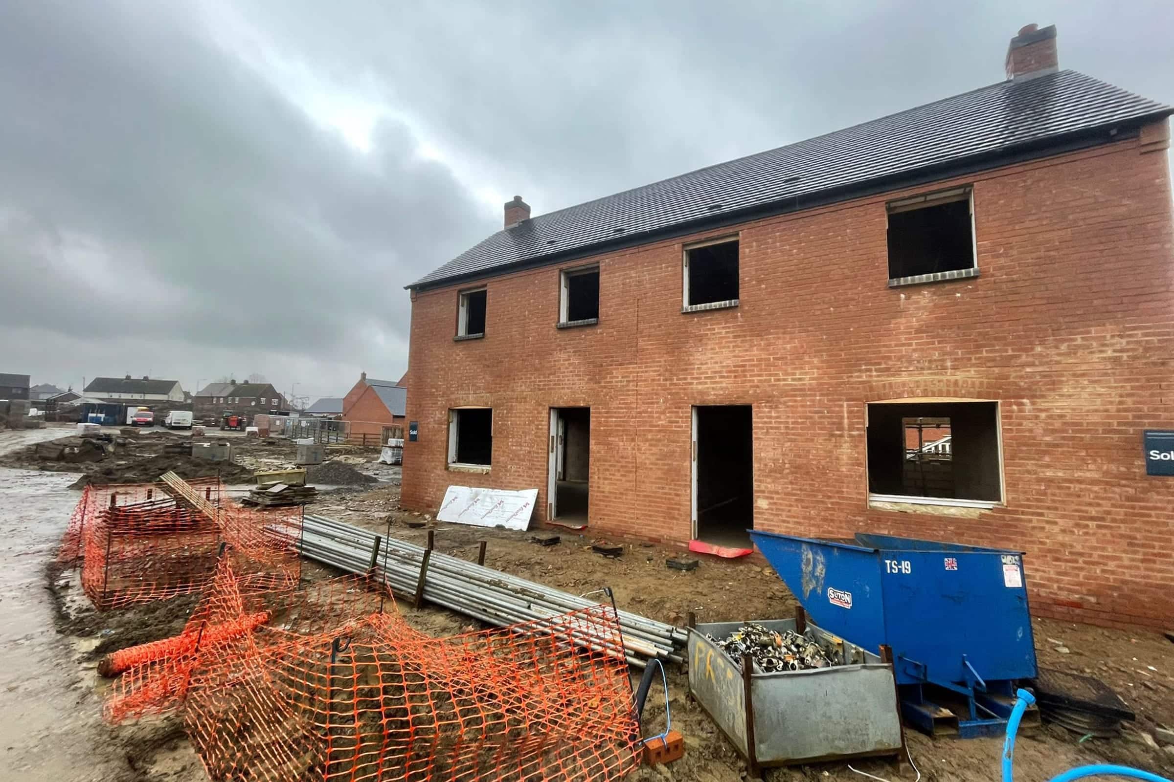 Underfloor heating screed at a new build home in North Kilworth, Leicestershire Exterior of a new build home on a building site in North Kilworth, Leicestershire