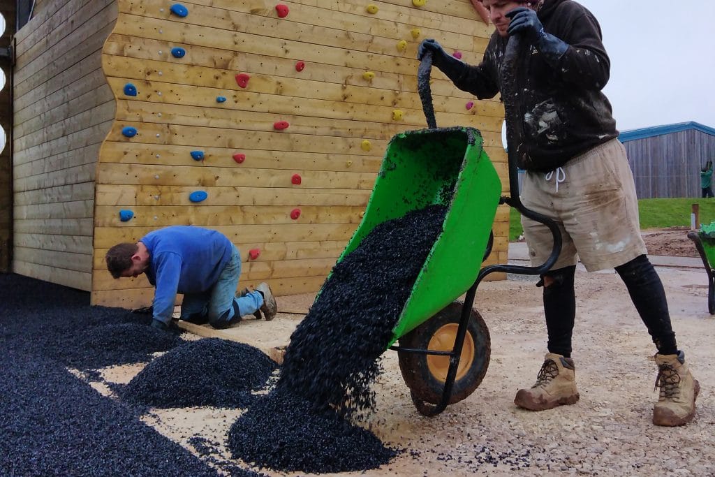 Rubber crumb surfacing