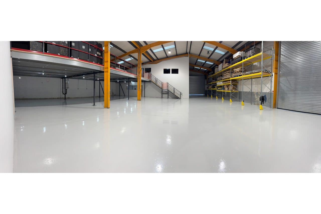 Large, clean, industrial warehouse interior