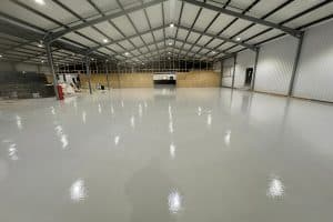 Shiny grey epoxy-coated warehouse floor