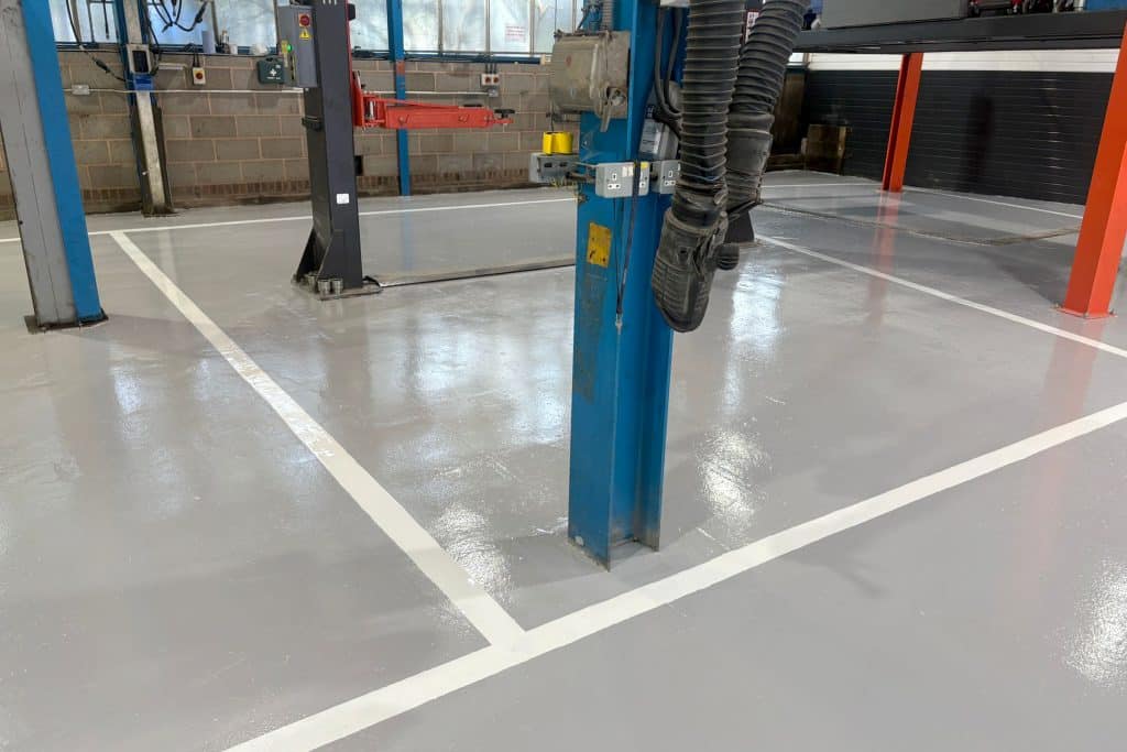 Clean mot garage floor with epoxy line markings