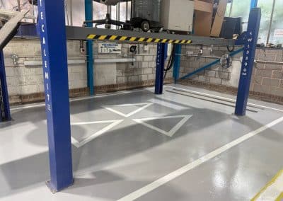 Clean mot garage floor with epoxy line markings