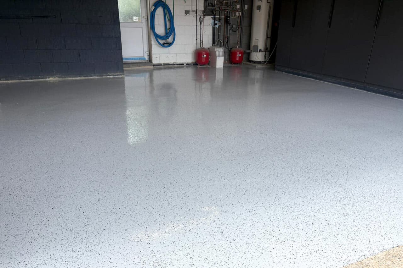 Epoxy flake flooring : Garage to gym conversion in Chatteris, Cambridgeshire Smooth, shiny epoxy resin flake garage flooring